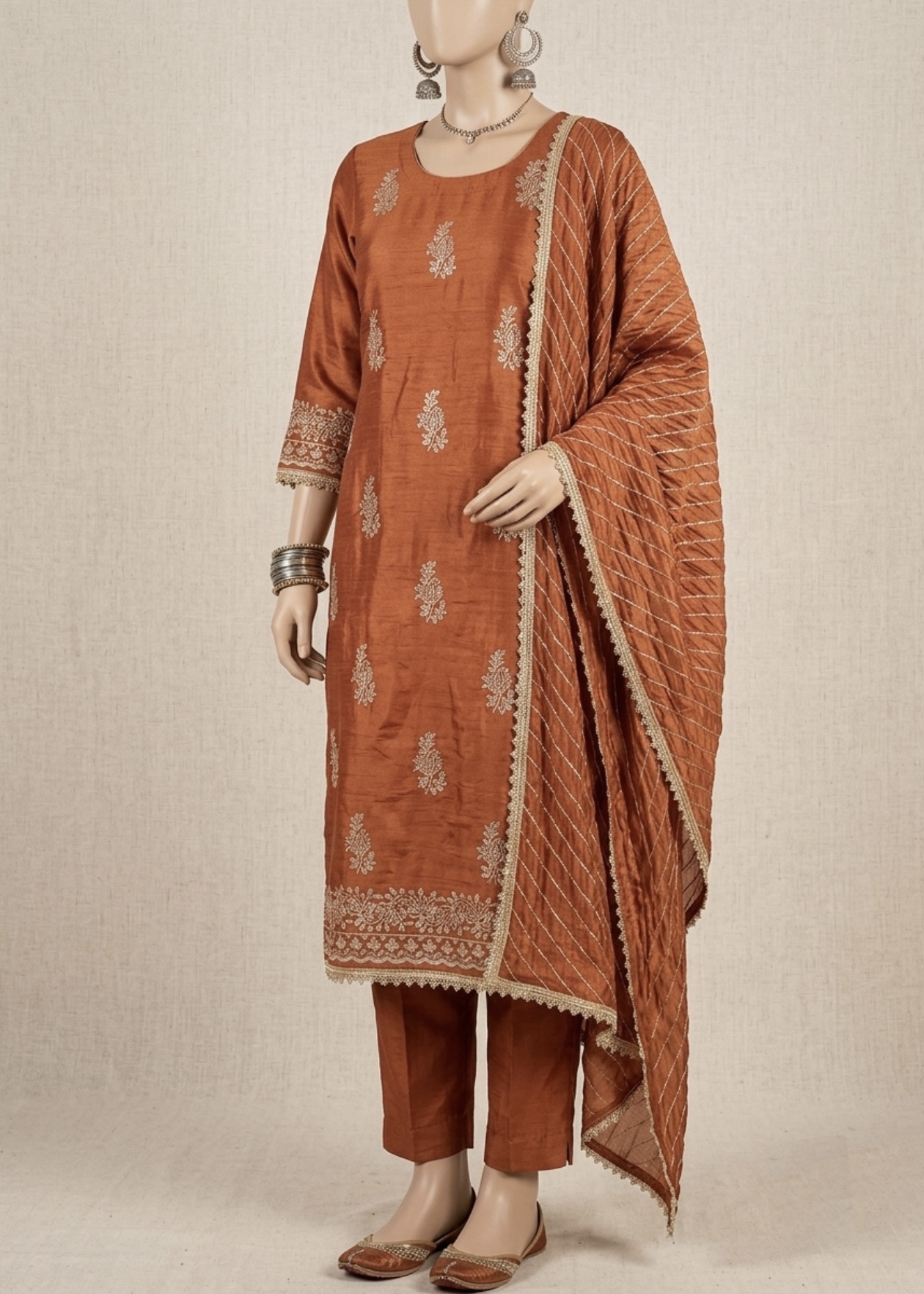 NAAZ in orange- a perfect festive wear